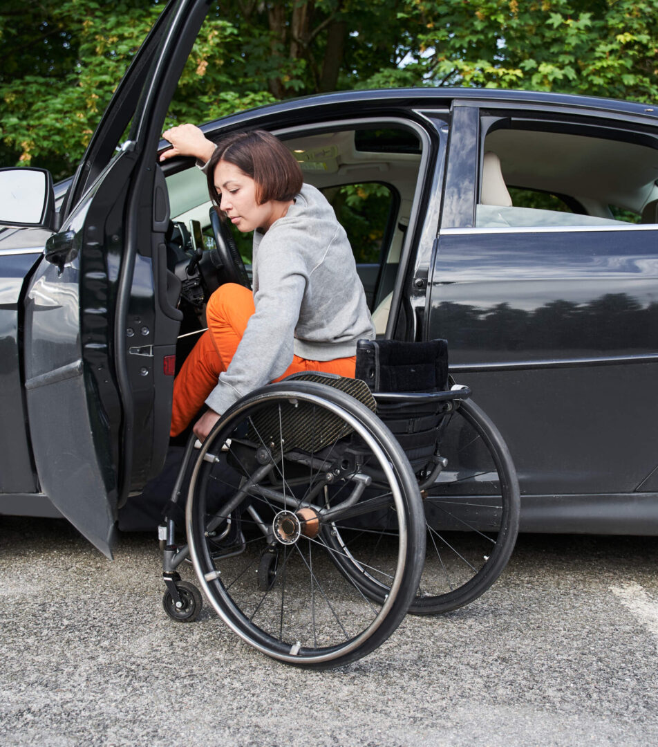 personne à mobilité réduite conduite